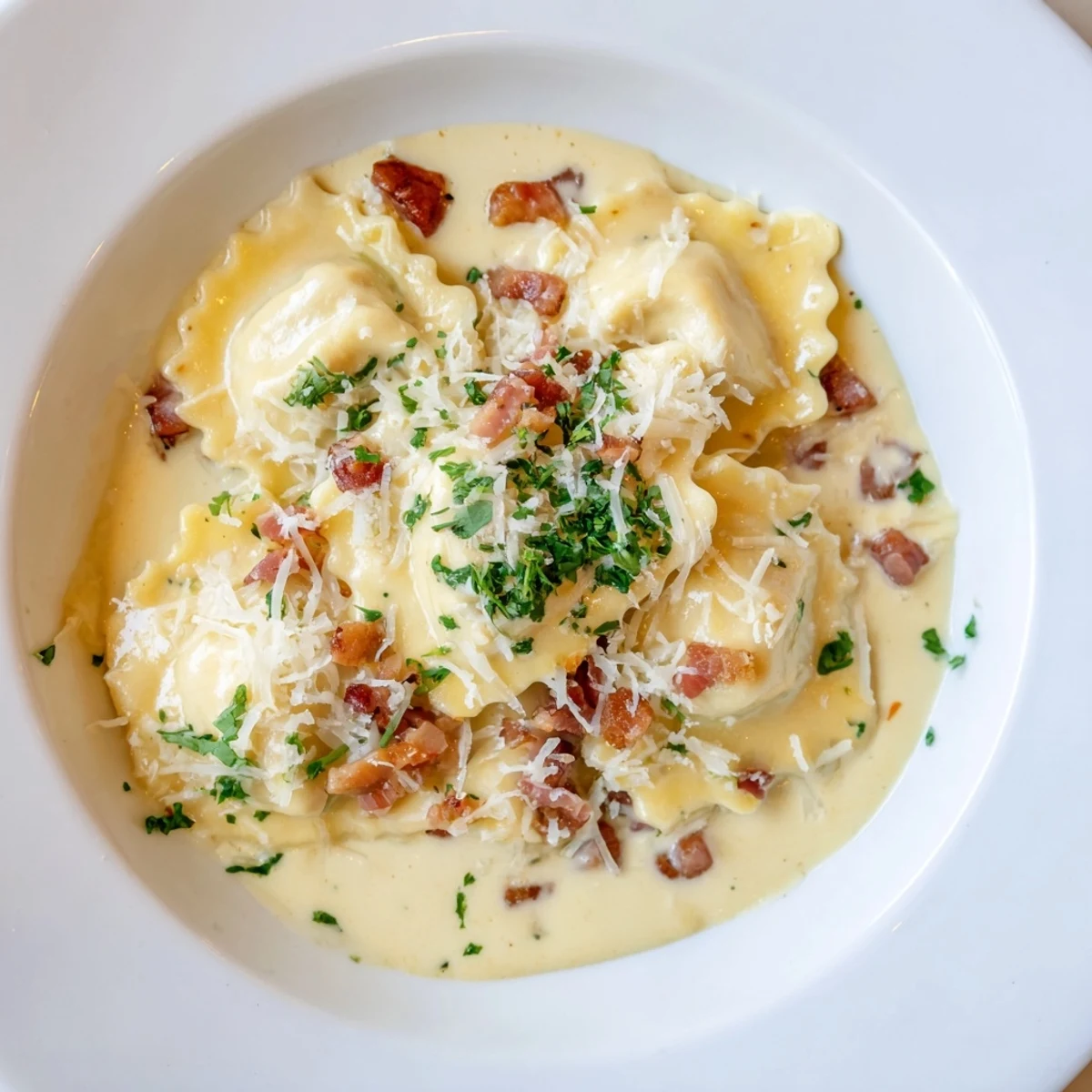 Creamy Olive Garden Ravioli Carbonara features tender cheese ravioli coated in rich, flavorful carbonara sauce.