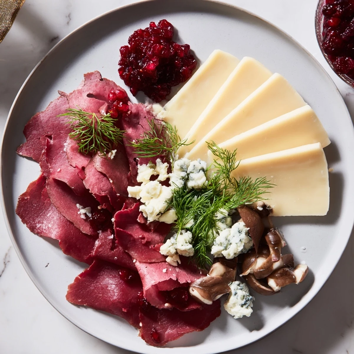 Gather around this Reindeer Charcuterie Platter, showcasing smoked reindeer and artisan cheese for your guests.