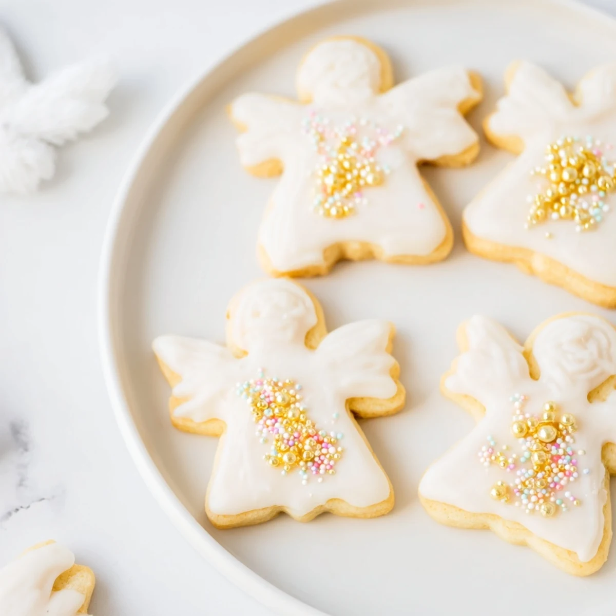 Golden-edged Biscuits Anges de Noël cookies provide a sweet, buttery crunch for Christmas celebrations.