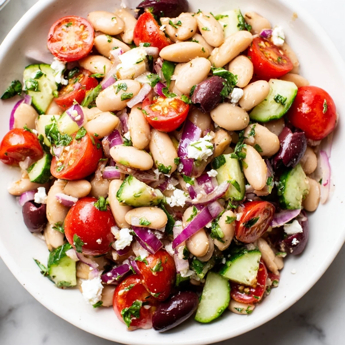 Vibrant white bean salad bursting with fresh herbs, ready for a delicious lunch.