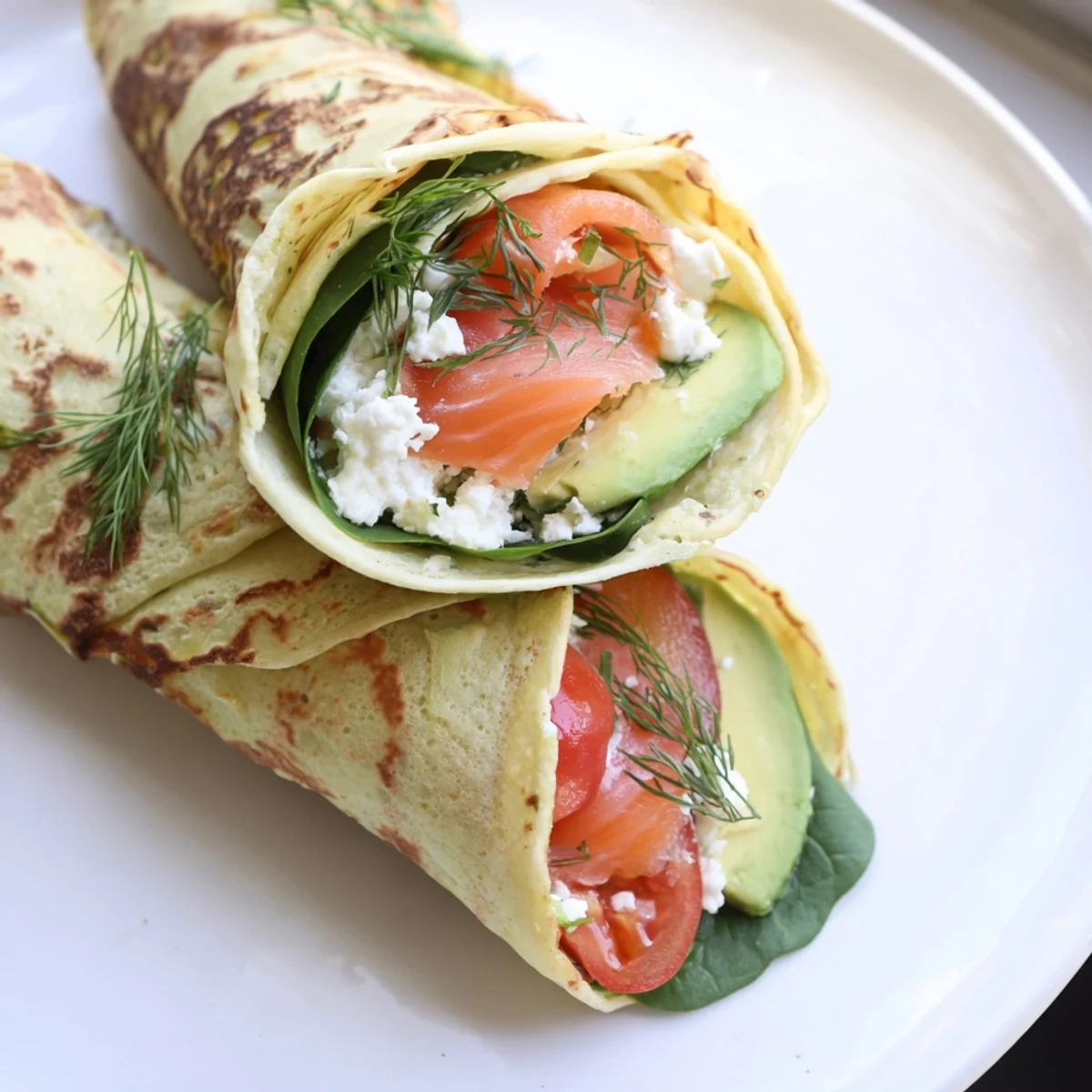 Enjoy a protein-packed Blender Egg Crepe Wrap, perfect for breakfast with vibrant, fresh fillings.