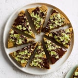 Golden-baked chocolate peppermint shortbread wedges with a peppermint candy topping, a holiday delight.