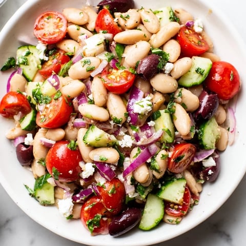 Vibrant white bean salad bursting with fresh herbs, ready for a delicious lunch.