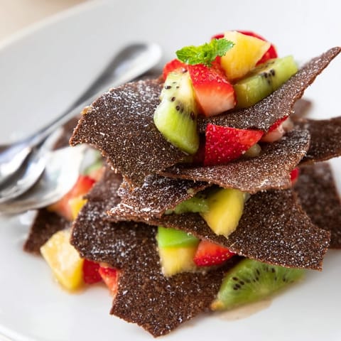 Delightful Dessert Chips & Salsa featuring chocolate tortilla chips and vibrant fruit salsa.  