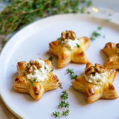 A delightful spread of Starry Night New Years Appetizers: puff pastry stars, crostini, and smoked salmon bites.