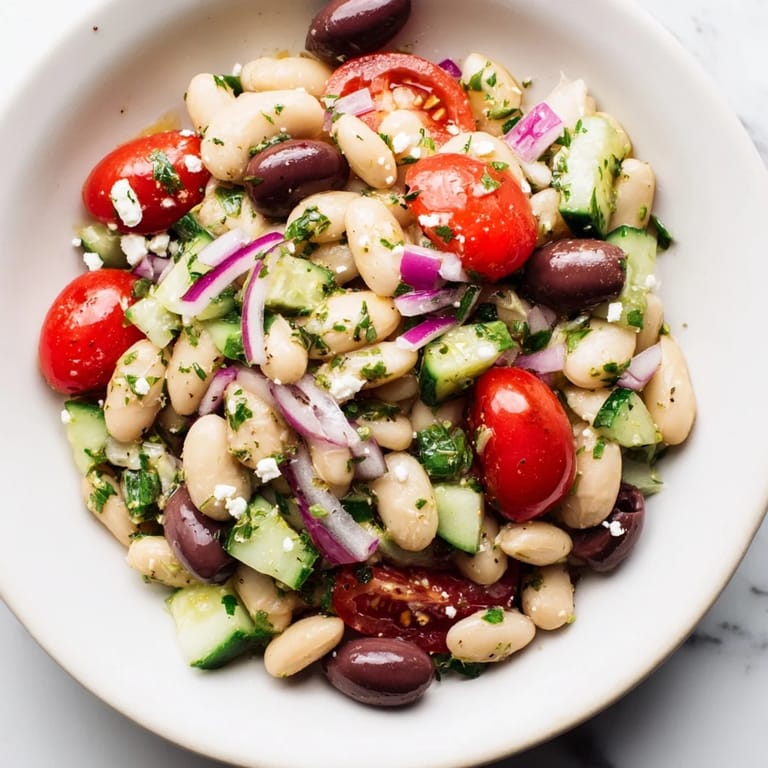 Creamy cannellini beans tossed with tomatoes make this refreshing white bean salad.